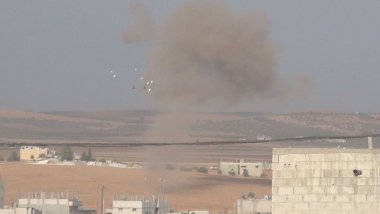 SOHR: Ji ber bombebarana Tirkiyeyê agir bi zeviyên Kobaniyê ket