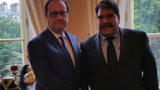 Francois Hollande pêşwaziya Salih Mislim kir .