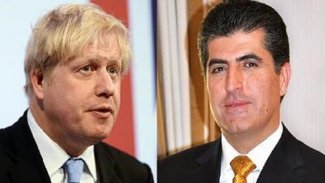 Serokê Herêma Kurdistanê pîrozbahîyê li Borîs Conson dike