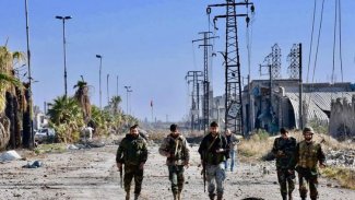 Li Helebê şer di navbera grûpên çekdar û artêşa Sûriyê de derket