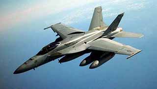 Rejim uçakları Halep'te Kürtleri bombaladı