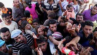 Ezidilere insani yardım dağıtılmaya başlandı