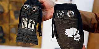 Eski ayakkabılardan Çirkin IŞİD üyelerini yapıyor