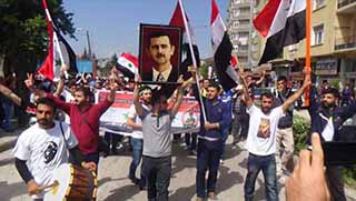 1 Mayıs kutlamaları Esad mitingine dönüştü!