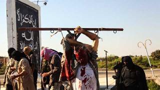 IŞİD oruç tutmayan 94 kişiyi çarmıha gerdi