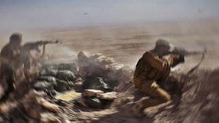 Yaralı Peşmerge'nin IŞİD üyesine karsı mücadelesi