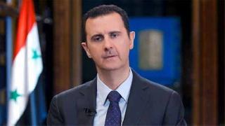 Esad:  Teröristlerin olduğu masada olmayacağız