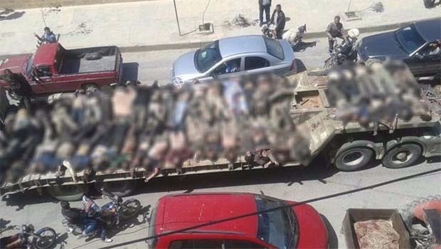 YPG'den, cesetlerin teşhirine özeleştiri
