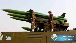 BM'nin komisyon önerisine 'hayır' deyip silahlı geçit yaptı 