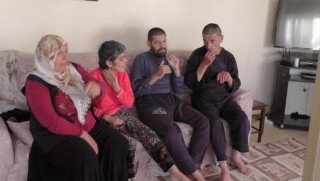 Muş'ta hayatını 3 engelli çocuğuna adayan anne 'Yılın annesi'