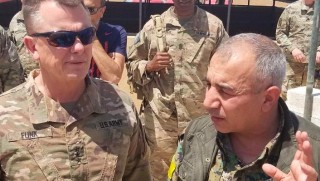 Koalisyondan YPG'li paylaşım