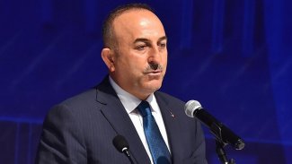 Çavuşoğlu'ndan flaş Esad açıklaması: Seçimi kazanırsa, onunla çalışmayı değerlendiririz