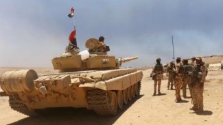 Irak, Suriye'de IŞİD mevzilerini bombaladı