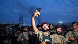 SMO, Til Temir'de öldürdüğü gencin görüntüsünü annesine gönderdi