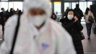 Çin'de ulaşım yasağı gelen şehir sayısı 13'e yükseldi