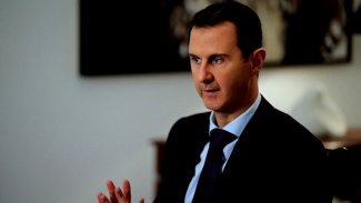 Almanya’daki sığınmacılardan Esad aleyhinde suç duyurusu