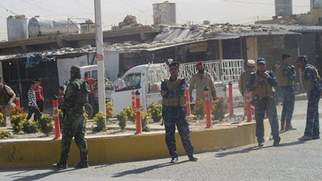 Şengal’de silahlı grupların bayrakları indirildi