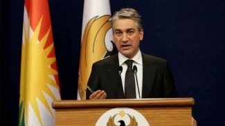 Hükümet Sözcüsü Adil'den Türkiye ile imzalanan anlaşma üzerine açıklama
