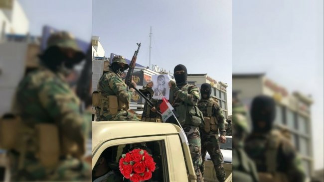 ABD'yi tehdit ettiler: Şii milislerden Bağdat'ta gövde gösterisi