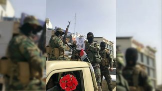 ABD'yi tehdit ettiler: Şii milislerden Bağdat'ta gövde gösterisi