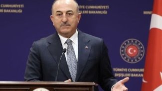 Çavuşoğlu'ndan Macron'a: Söz söylemek haddine değil